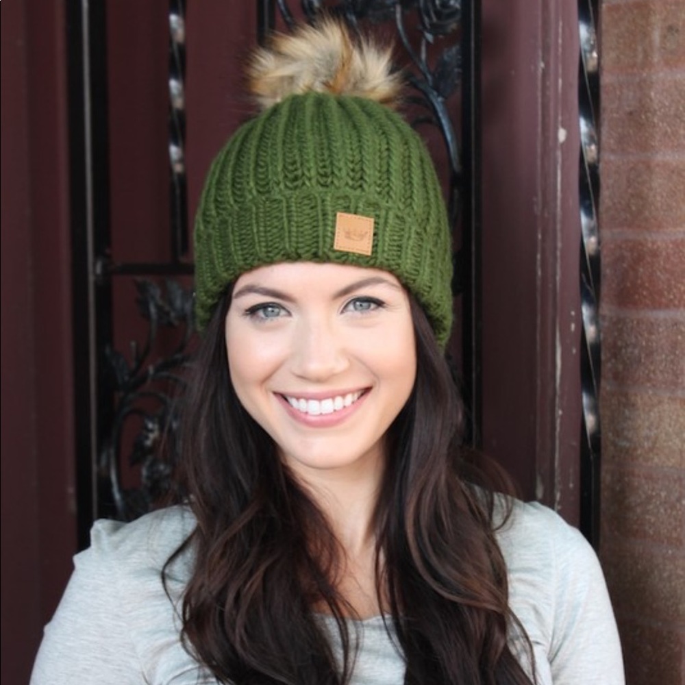 Fleece lined slouchy knit hat with Pom accent